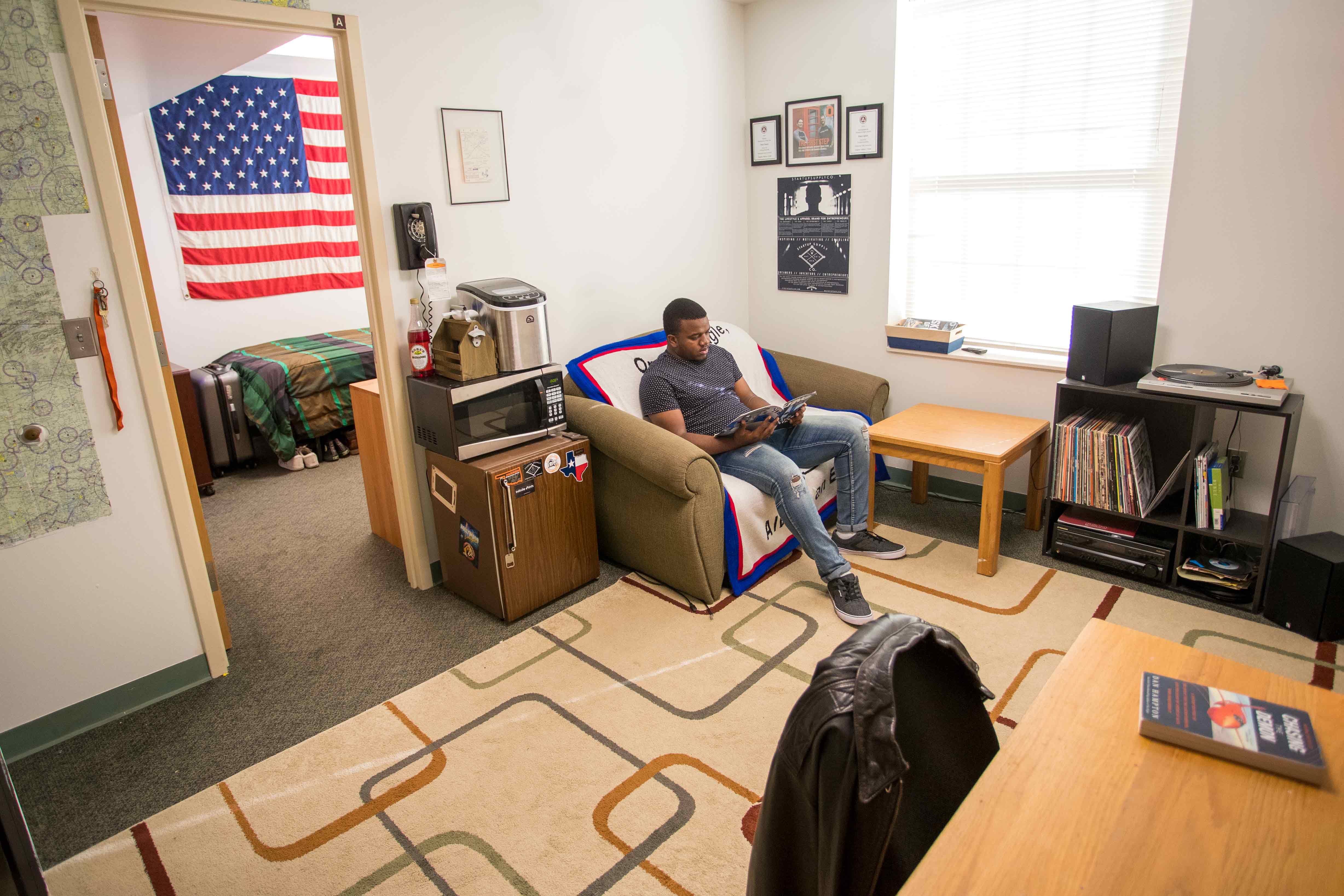 boy doing homework in Bennett Hall Bedroom